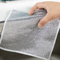 Double-sided microfiber scrubber cloth for effective kitchen cleaning.