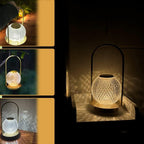 Hand reaching to touch the base of the LED lamp to adjust brightness.