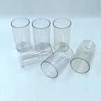Ganesh Classic Plastic Glasses Set of 6 transparent tumblers, showcasing durability.