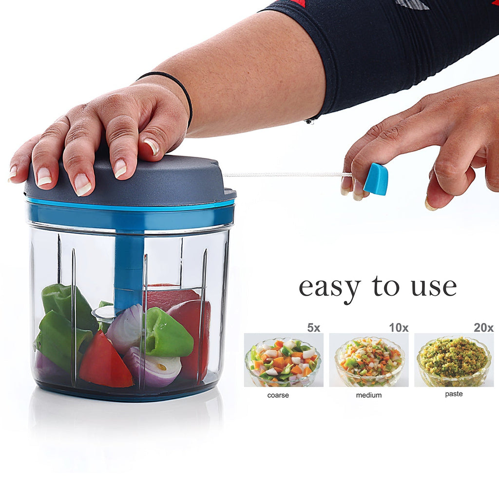 Ganesh Master Chopper with various chopped vegetables, demonstrating its versatility.