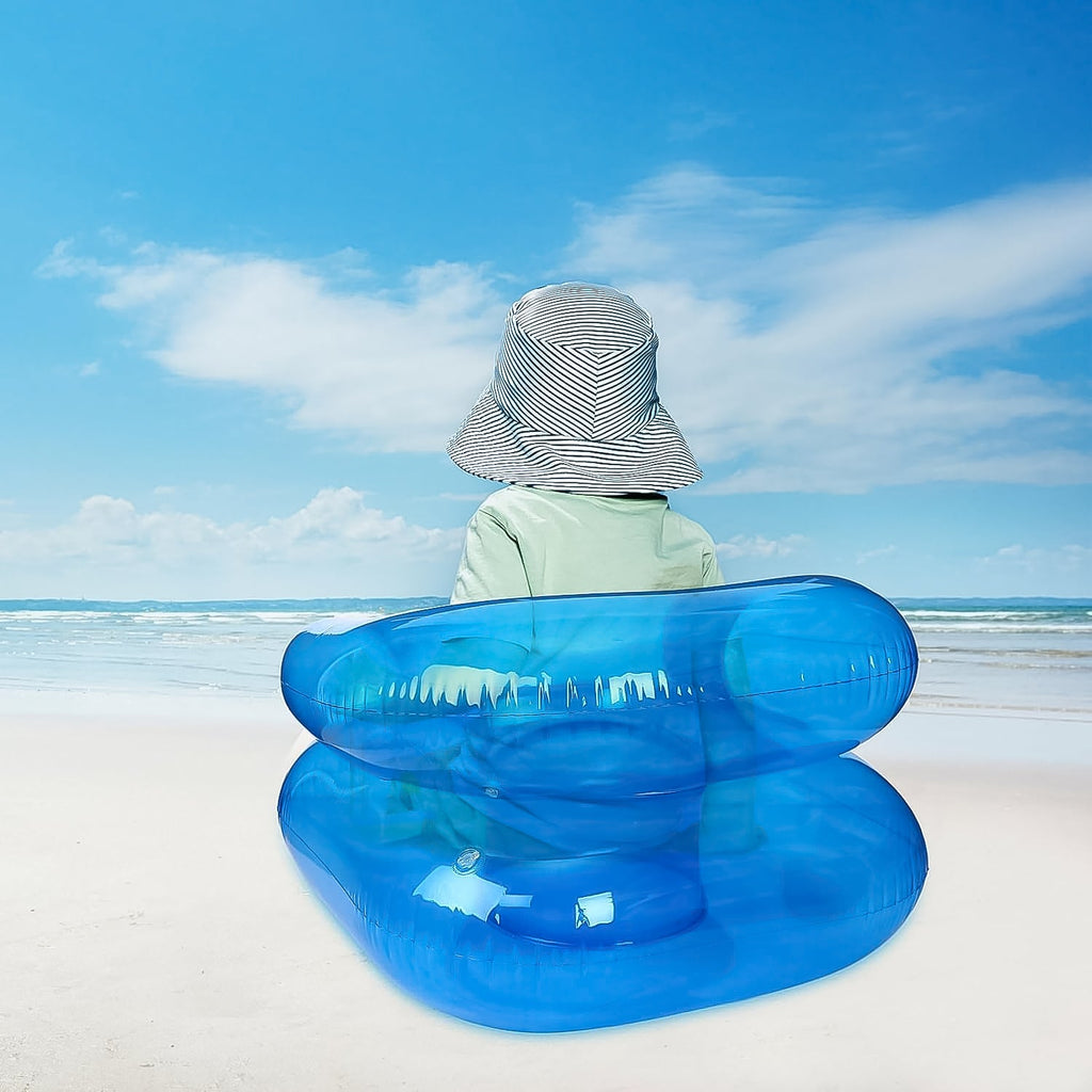 Another side view of the sturdy blue inflatable sofa chair for children.