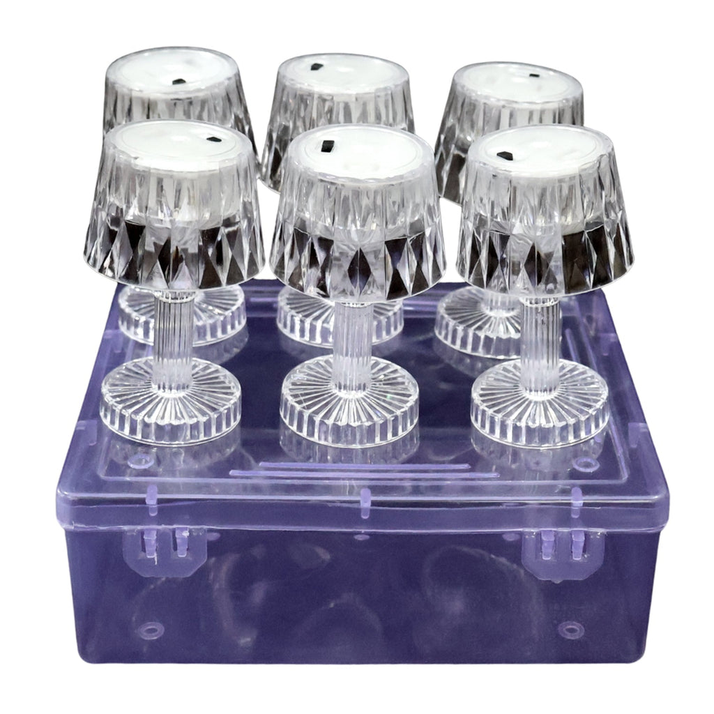 Portable LED mini table lamps providing flameless, flickering ambient illumination.
