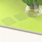Multi-use clear adhesive tape demonstrating residue-free removal from a surface.