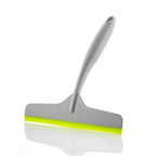Grey kitchen wiper featuring an ergonomic handle for comfortable grip.