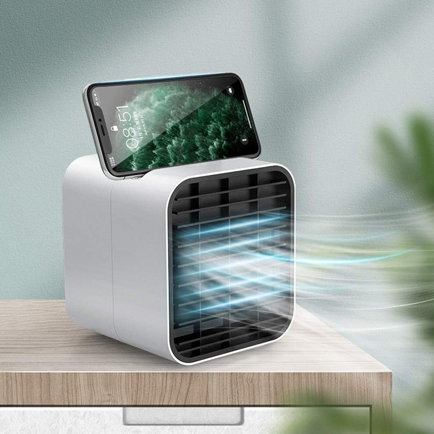 Pink portable mini air cooler fan with water cooling function on desk