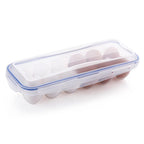 Egg storage tray with its lock clips open, ready for filling.