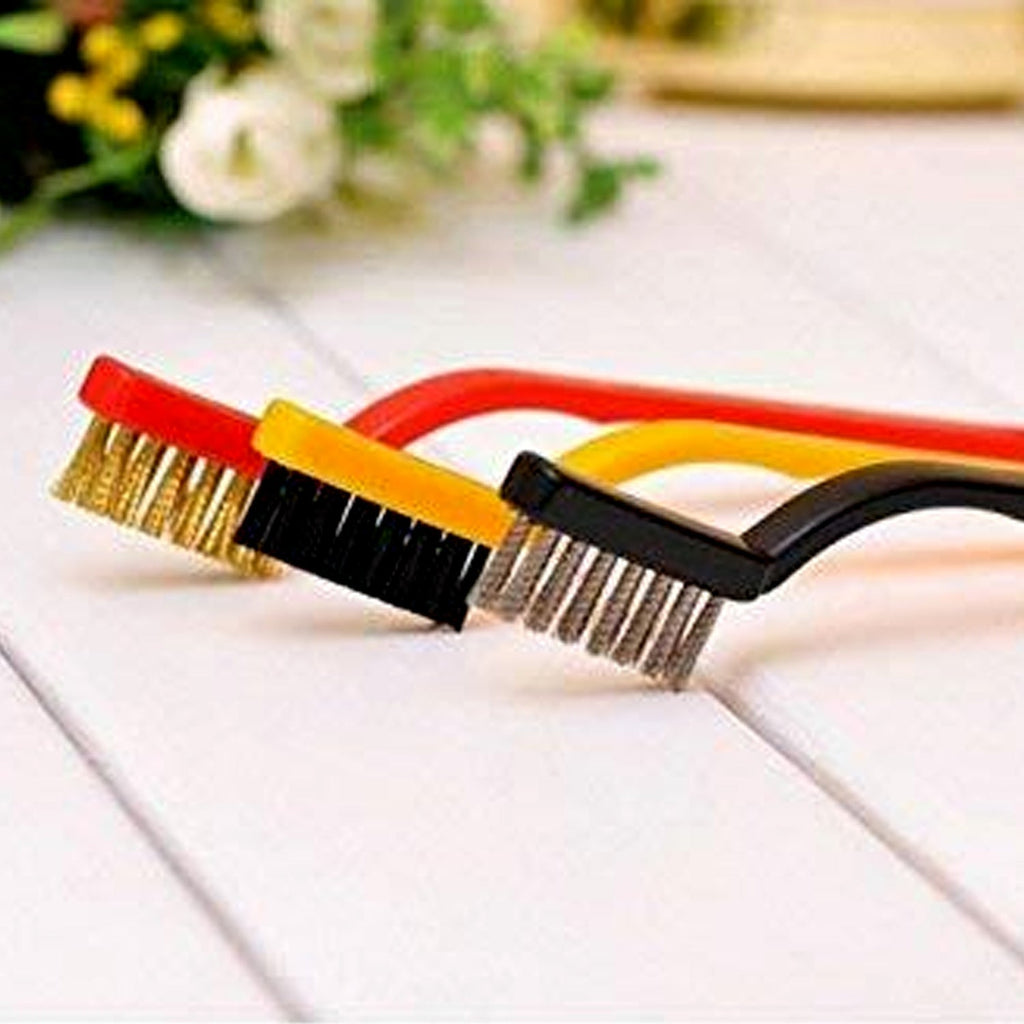 The brass and stainless steel brushes from the mini wire brush set, demonstrating their robust construction.