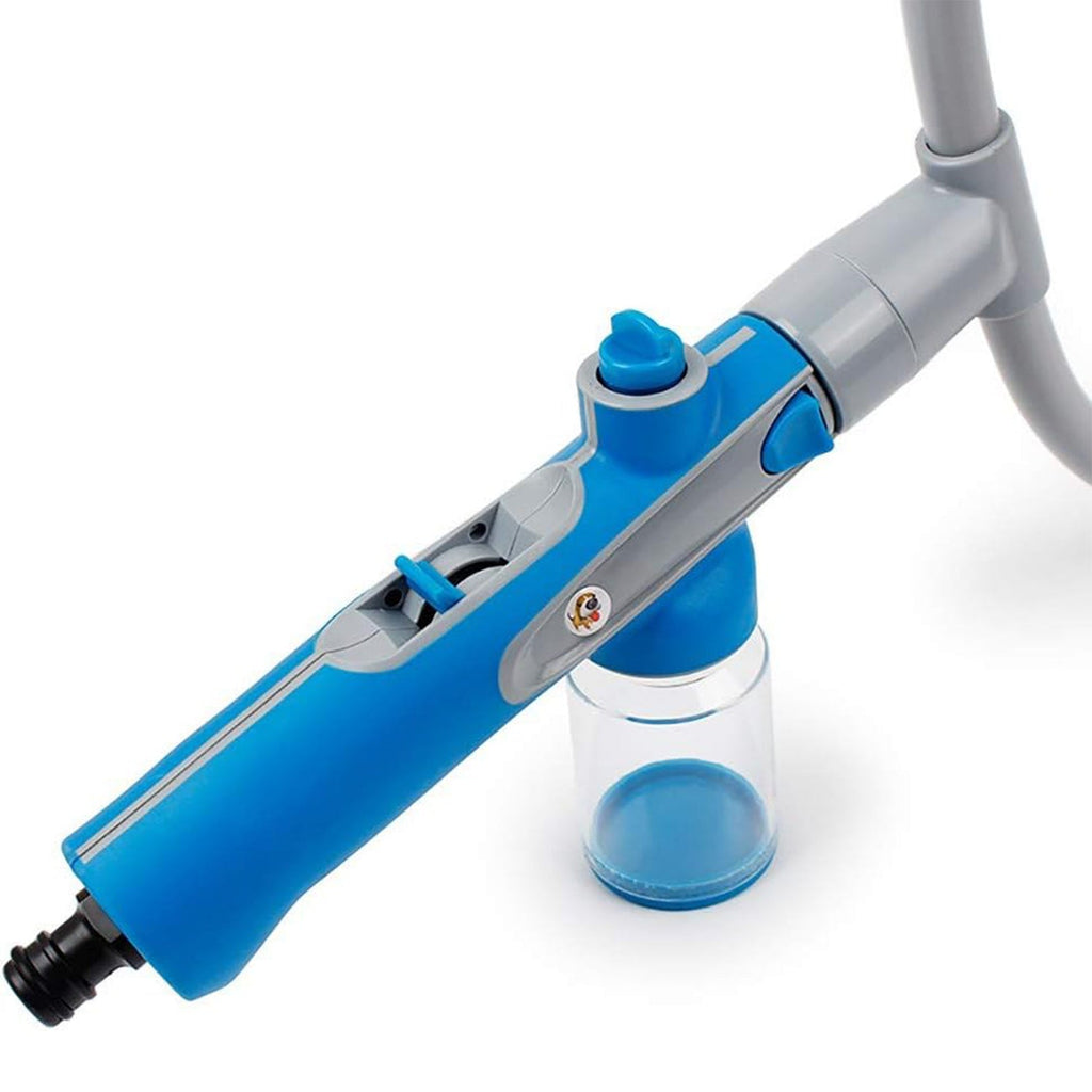 Pet Shower Sprayer being used to bathe a small dog, demonstrating 360-degree cleaning.