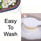 Soft and highly absorbent bath mat featuring a charming floral design.
