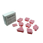 Assorted unique shaped ice cubes, perfect for adding flair to any beverage.