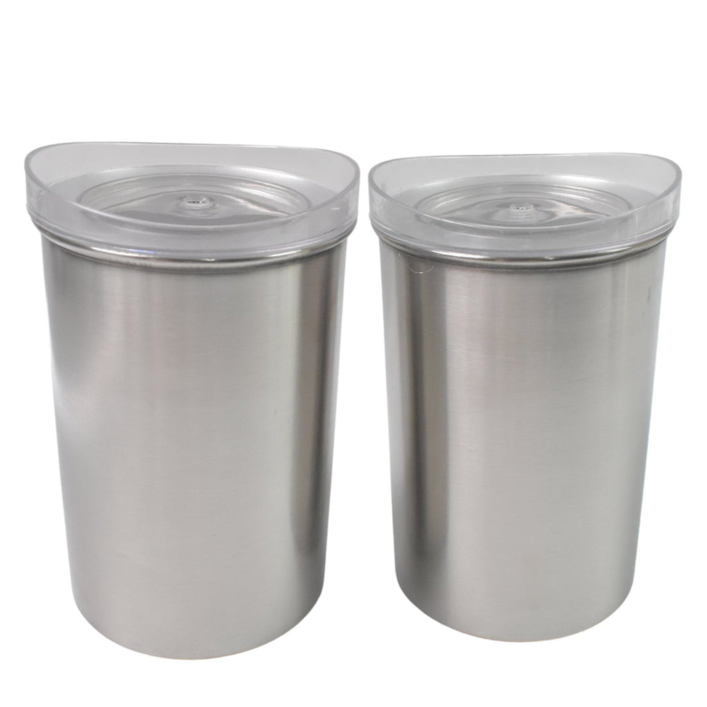 Close-up of the transparent lid and brushed finish of a Konvex steel container, highlighting quality.