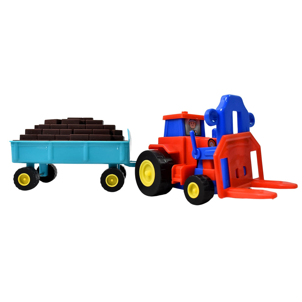 Close-up of the front of the plastic friction tractor, highlighting its detailed design.