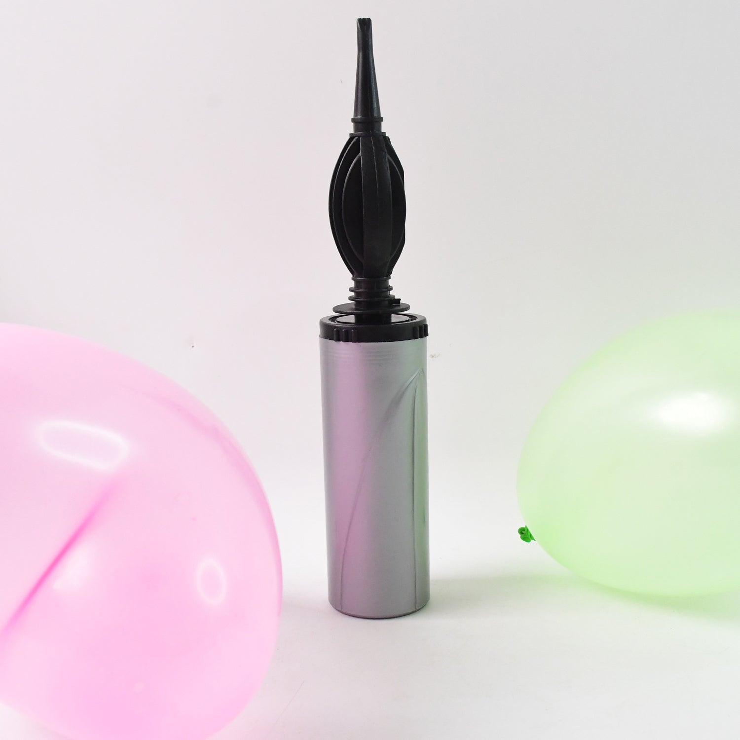 Manual hand pump used for inflating balloons and inflatables