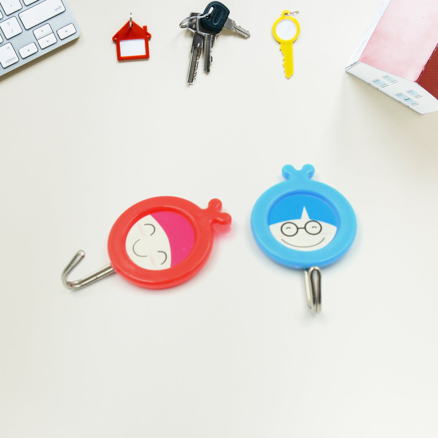 Simple installation process for strong self-adhesive hooks, holding up to 2kg.