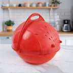 Lifestyle shot of the revolving washing bowl with fresh produce.