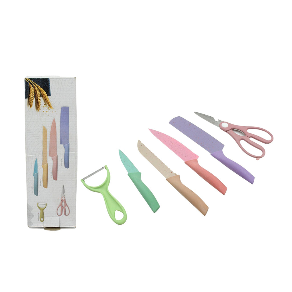 A hand efficiently uses the ceramic peeler, part of the versatile kitchen knife set.