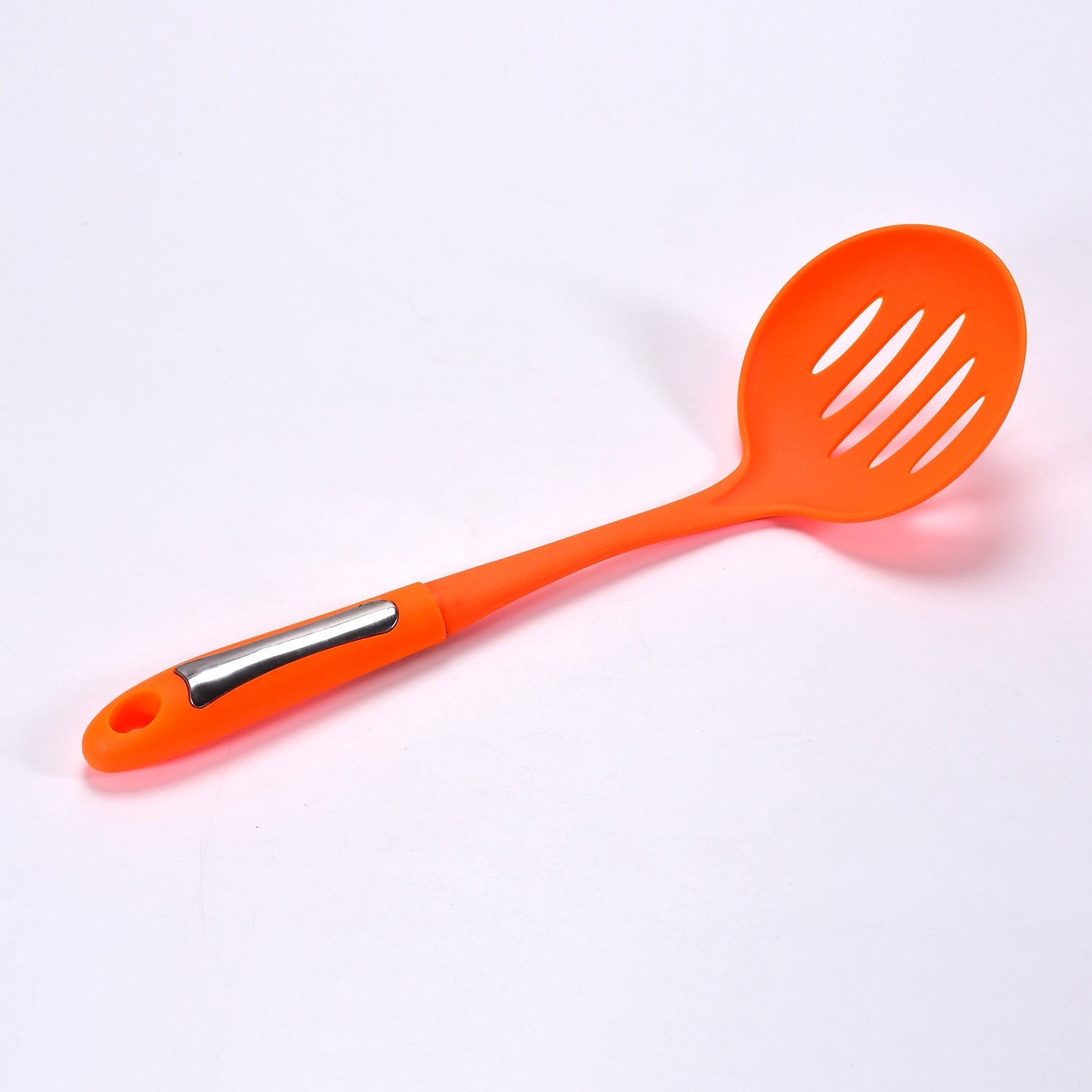 A 35cm cooking shovel expertly filtering soup, highlighting its straining capabilities.