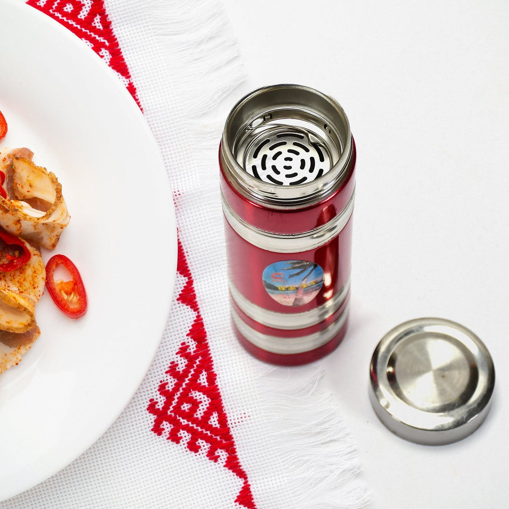 Angled view of the durable 380ml stainless steel bottle with cap on.