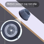 Washing machine and dryer stabilized with anti vibration pads on a tiled floor.