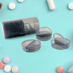 Close-up of a single AM/PM daily pill box, demonstrating its capacity for medications.