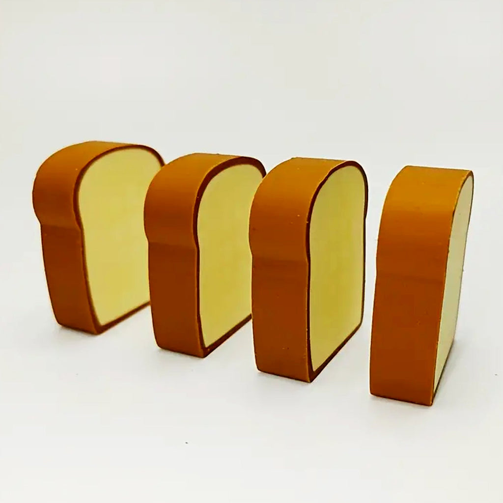 Four cute food erasers in the shape of toast bread, perfect for kids' stationery.
