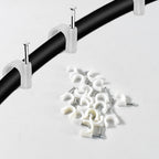 Strong hold plastic cable clip attached firmly to wooden surface