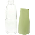 The 500ml oil dispenser actively in use for precise cooking in an Indian kitchen.