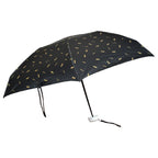 Top-down view of the closed compact umbrella with its zip case.