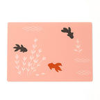 Set of four stylish dining placemats with fish patterned design