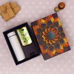 Festive gift hamper packaging with premium Kesar Pista chocolate almonds and bottle