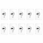 Kitchen utensil hanging on adhesive wall hook