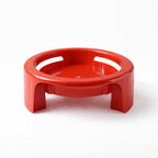 Matka Stand supporting a plant pot in a home setting, illustrating its versatile use.