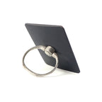 Side profile of the compact phone ring stand, highlighting its slim design.