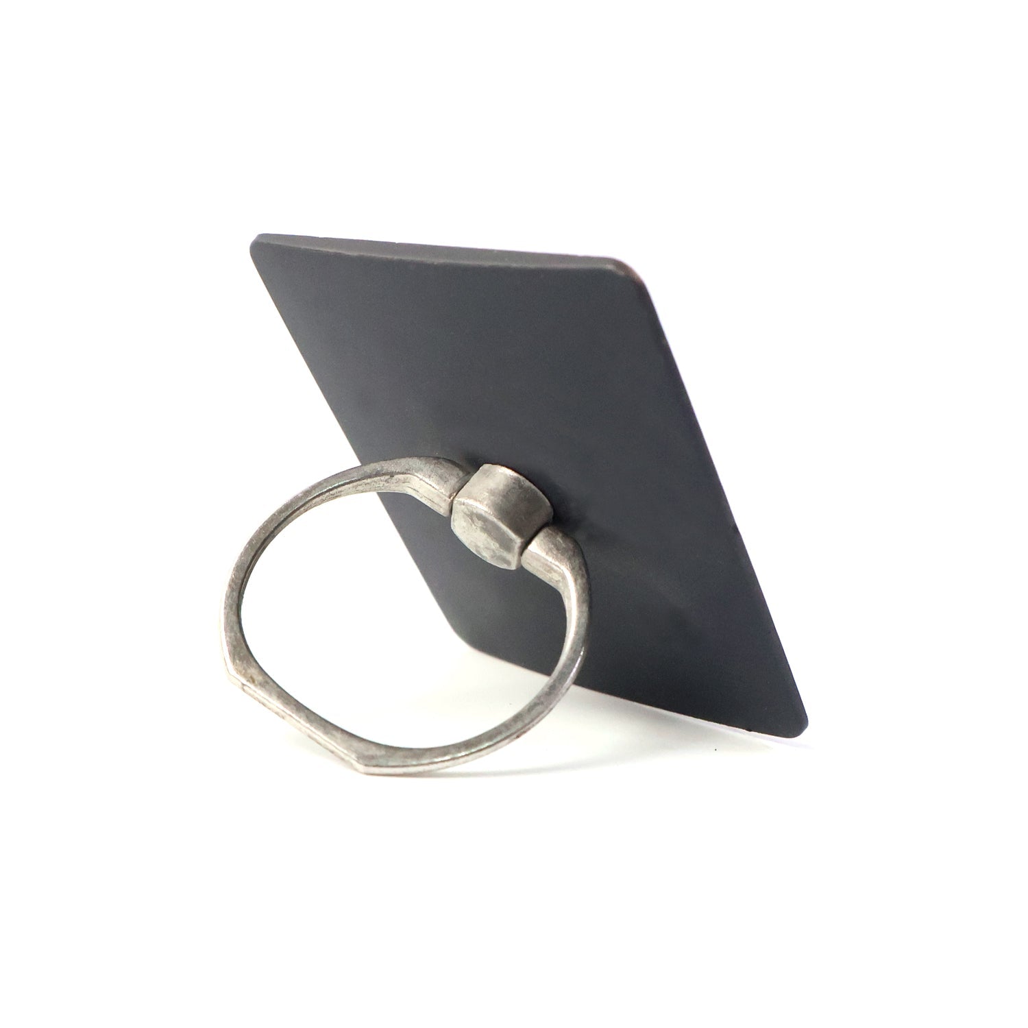 Side profile of the compact phone ring stand, highlighting its slim design.