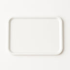 Hand holding lightweight 40x30 cm plastic serving tray comfortably
