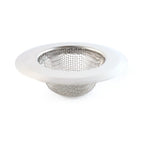 Stainless steel kitchen sink strainer filtering food particles and hair