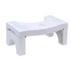 The toilet squat stool folded flat, demonstrating its compact size for easy storage.
