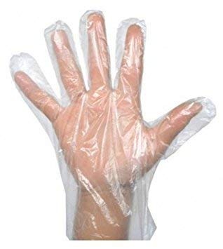 Detailed view of a single transparent disposable glove, highlighting its smooth texture.