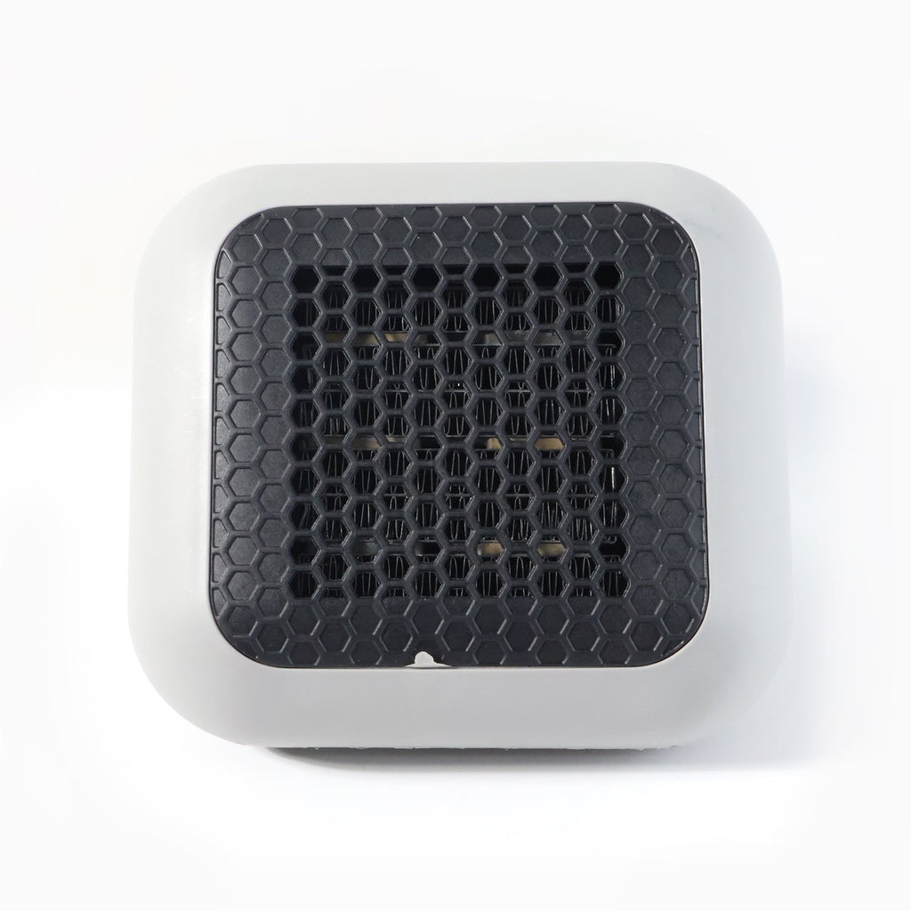 Small room warmed by the compact 600W plug-in wall-mounted room heater