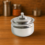 Top-down view of the Stainless Steel Ghee Pot with its lid and ladle.