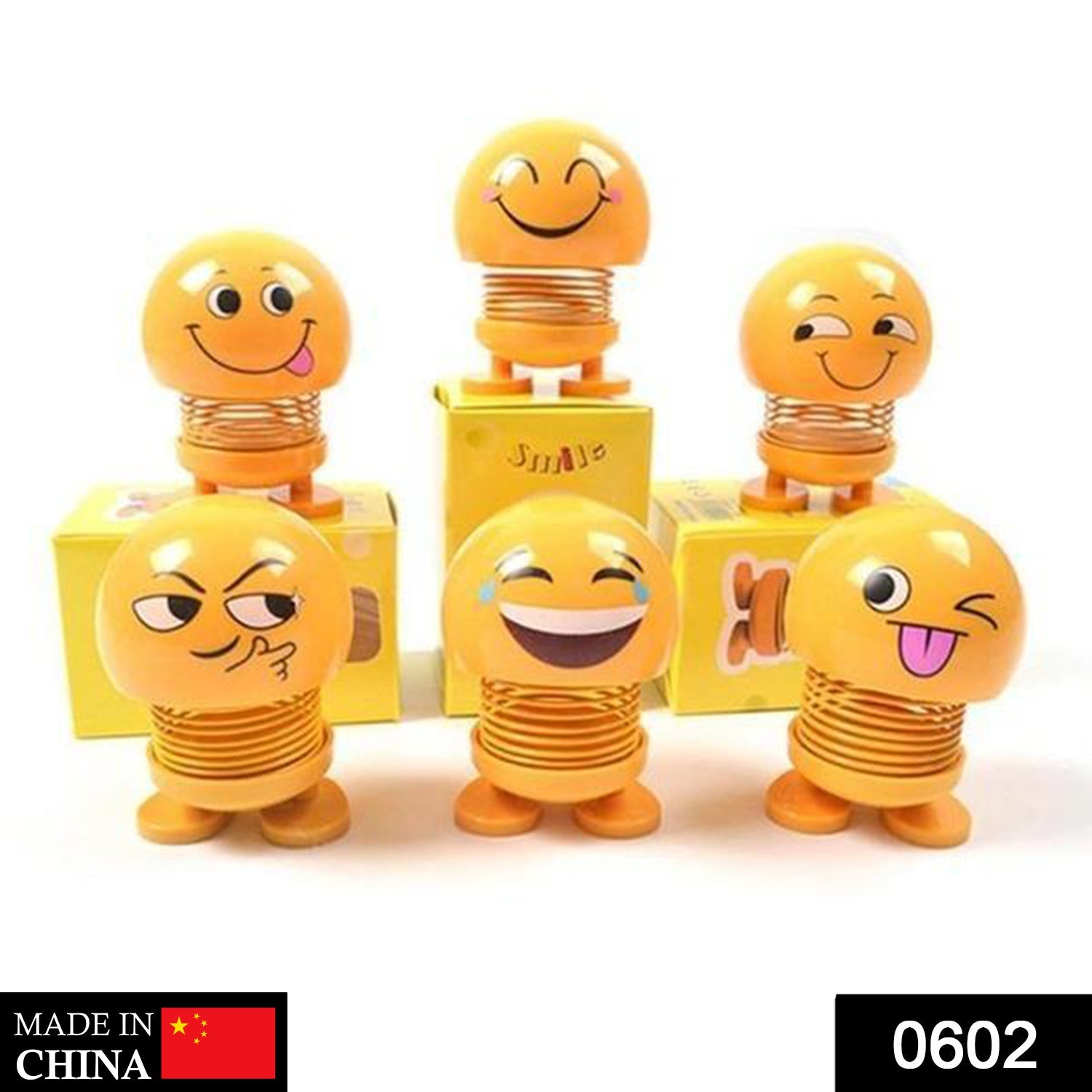 Front view of a funny bobblehead smiling face spring doll for desk decor.
