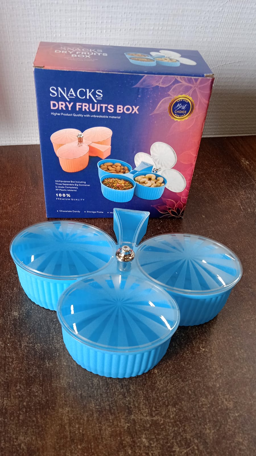 Stylish blue revolving dry fruit box suitable for kitchen and dining