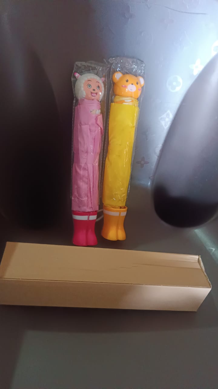 Cartoon foldable umbrella with mixed colorful designs suitable for travel