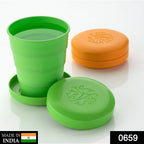 Compact expandable silicone tumbler in its folded state, ideal for easy travel.