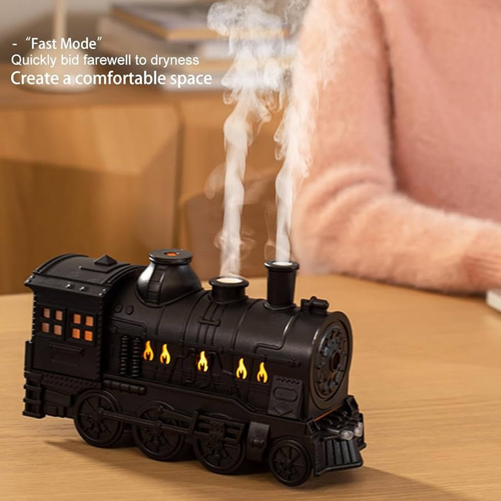 Portable mini humidifier with retro train aesthetic and mist output