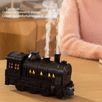 Portable mini humidifier with retro train aesthetic and mist output