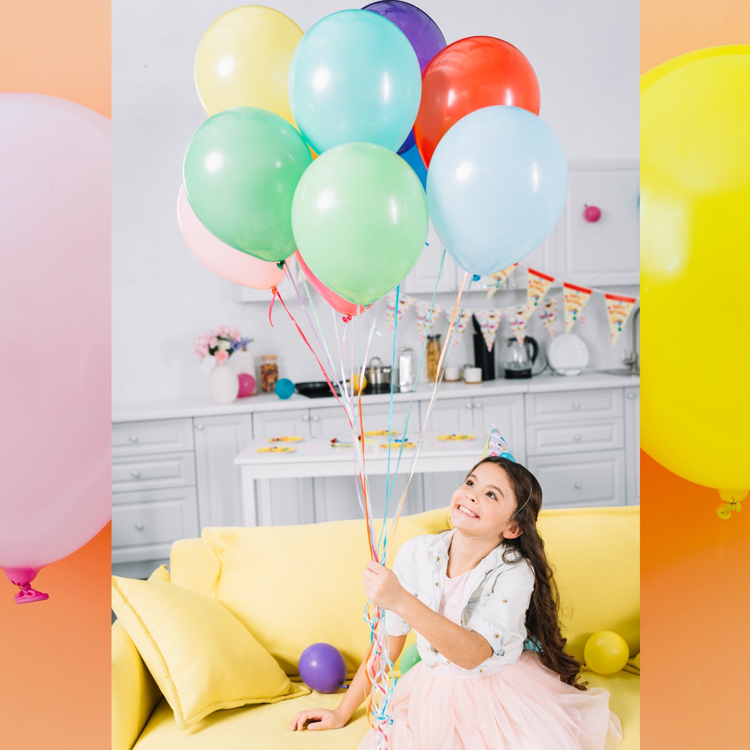 Assorted party balloons in red, blue, green, and yellow hues.