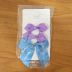 Set of satin bow hair clips perfect for kids' hair styling