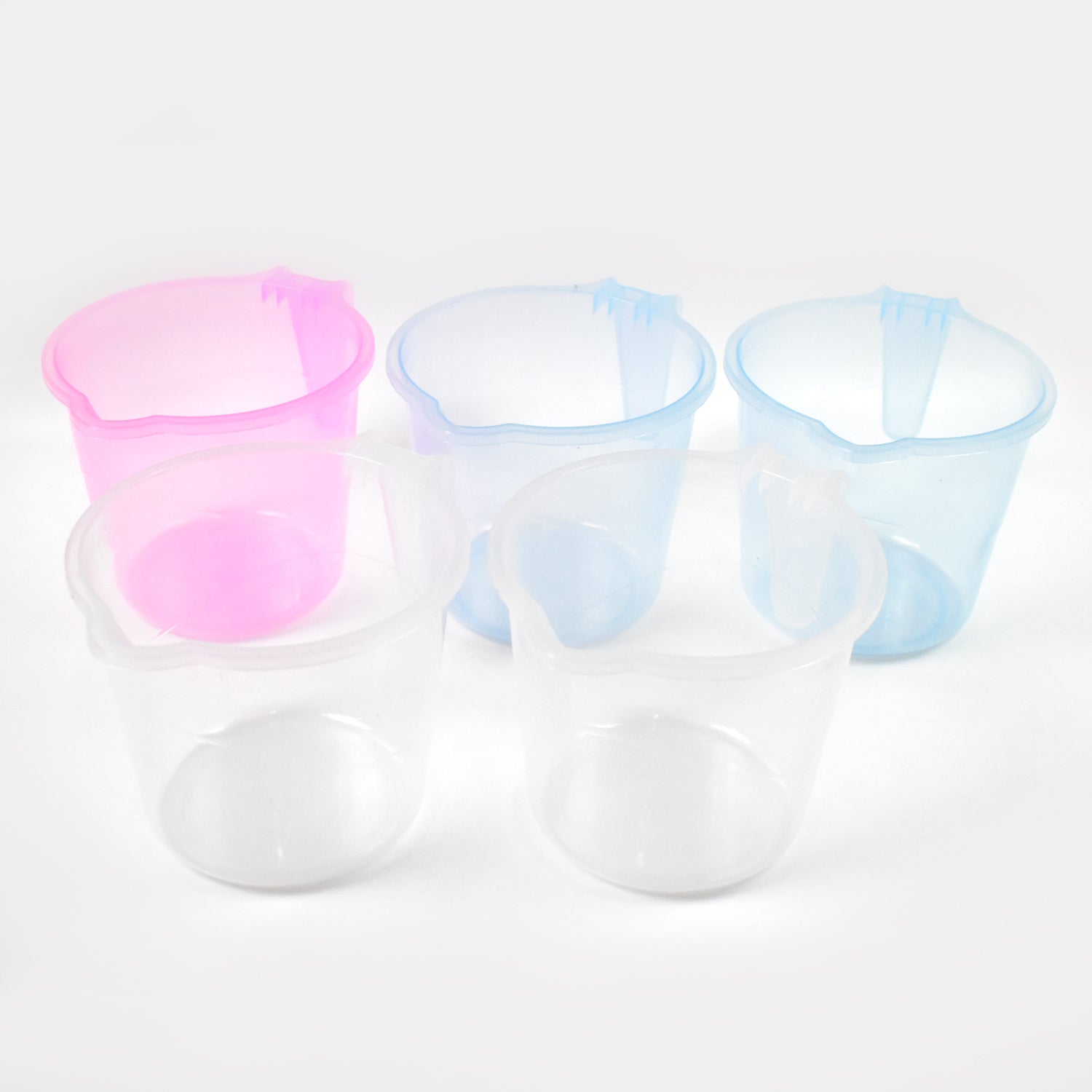 Ergonomic handle design on a transparent plastic bathing mug for easy grip.