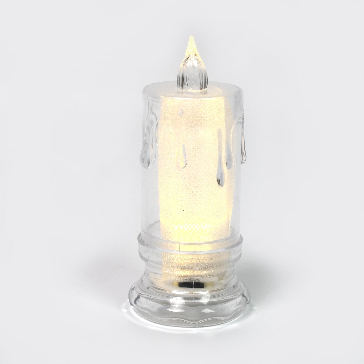Glowing LED Tea Light Candle adding a warm ambiance to a holiday setting.